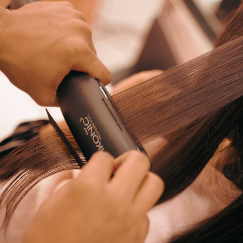 Professional hair styling at The Beauty Empire Mysuru